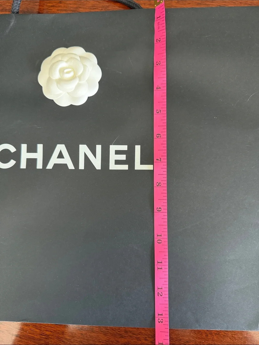 CHANEL Black Shopping Bag with White Camellia Accent